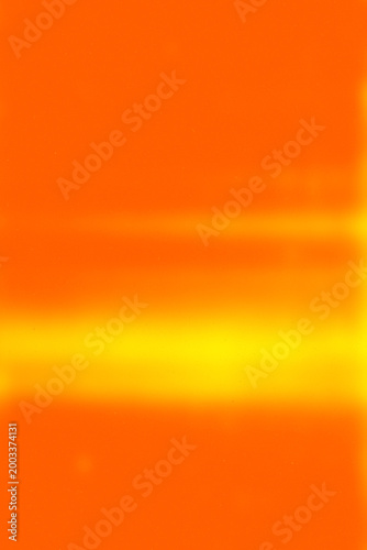 Warm orange abstract background with soft horizontal light glow and smooth gradient for banners, summer themes, and vibrant design projects