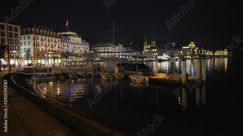 Shot of Lucerne illuminated old town and historic buildings at night
