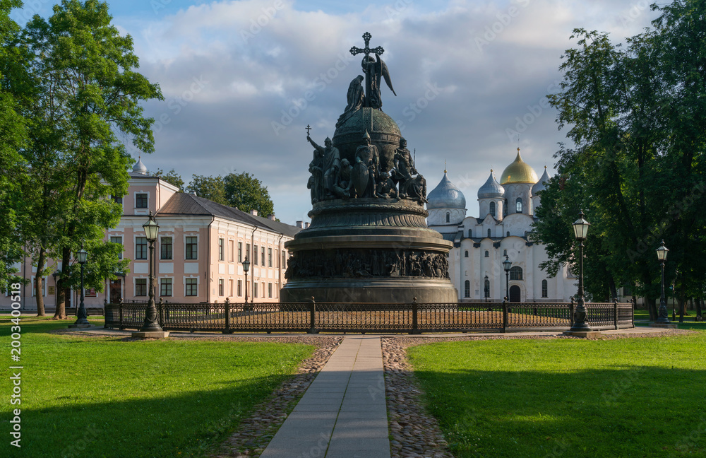 Obraz premium The Monument to the Millennium of Russia, erected in the Novgorod Kremlin in 1862, with the St. Sophia Cathedral in the background, Veliky Novgorod, Russia