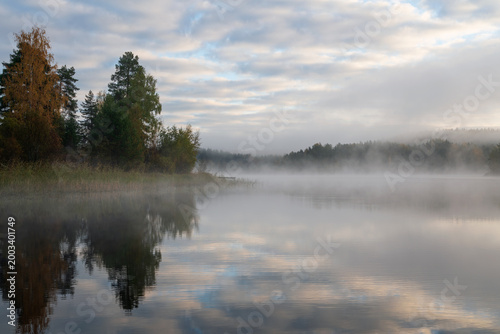 Ladoga Skerries National Park near the village of Lumivaara on an early foggy autumn morning, Republic of Karelia, Russia