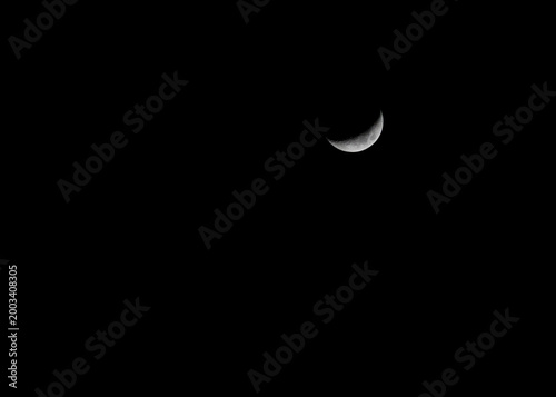 Waxing Crescent Moon in Night Sky