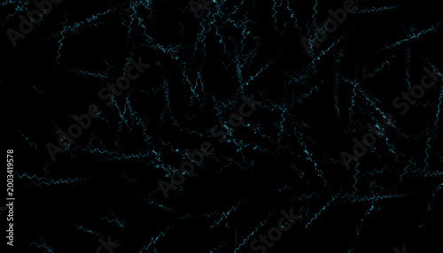 dark background with blue and green light trails