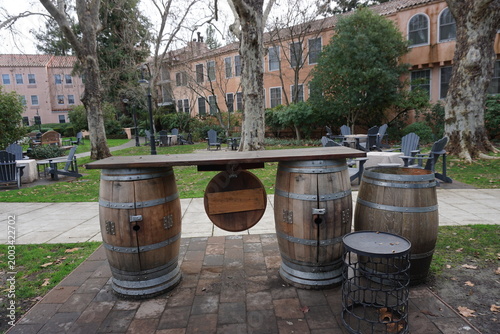 closeup on old wine wood barrels  bar in a resort in napa/sonoma valley, ca, usa