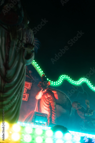 Haunted house at night in amusement park Prague Czech Republic Europe glowing horror attraction background