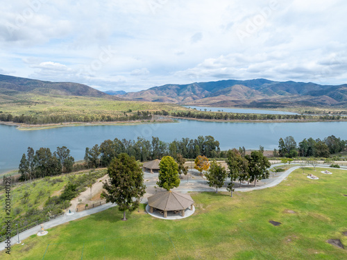 Aerial view of Otay Lakes County Park in Chula Vista, California, a scenic view of a mountain range, the lake. High quality photo
