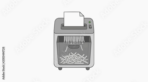 A detailed grayscale image of a document shredder, efficiently destroying confidential information.