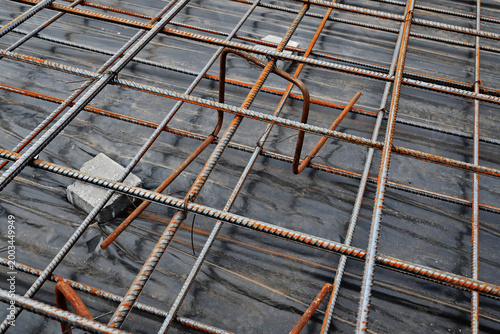 Photography a construction site with tied reinforcement for pouring a concrete foundation fo