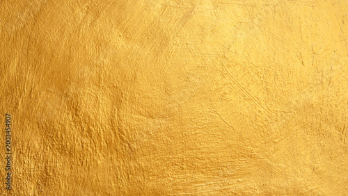 Golden Acrylic Paint Brush Stroke Texture on Textured Wall Background.