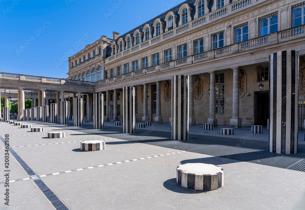 Naklejka premium Paris, France - 04 25 2026: View of the courtyard of the honor gallery in the National Estate of the Palais-Royal with Columns and buildings
