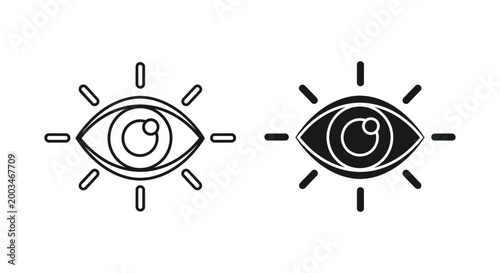 Human eye icon set with surrounding rays for vision perception and focus concept vector illustration