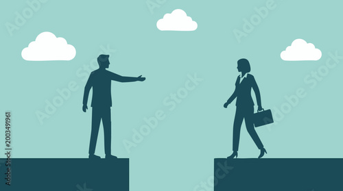 Photos Silhouetted business people across a chasm, concept of connection or division