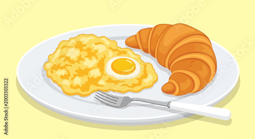 Scrambled eggs and croissant breakfast.