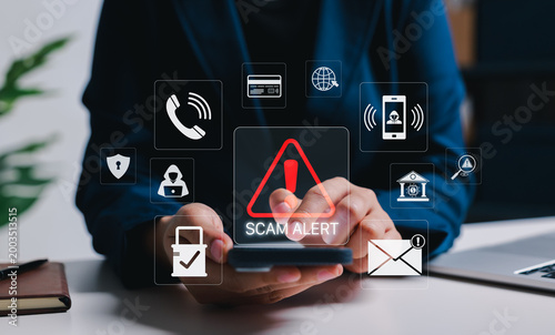Fotografie Scam alert and mobile fraud prevention security concept
