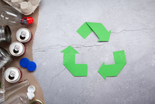 Fotografie Recycling Concept With Plastic Bottles Aluminum Cans Glass Jar Metal Tin Egg Car