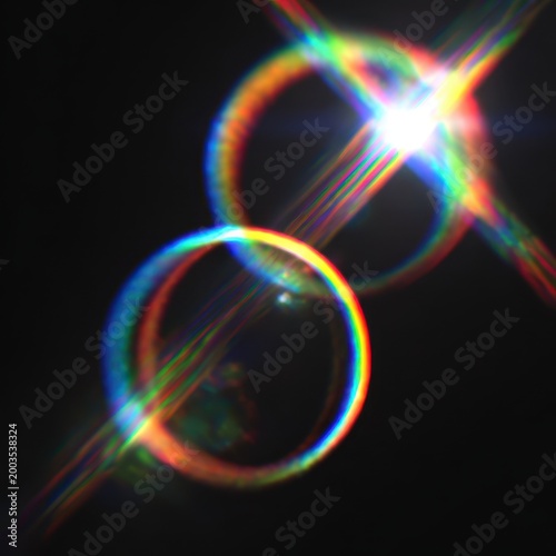 Vibrant Rainbow Lens Flare with Starburst and Rings on Black Background