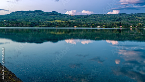 Panorama of the reflections in the lake at dusk at Tyhee Lake Provincial Park, British Columbia, Canada