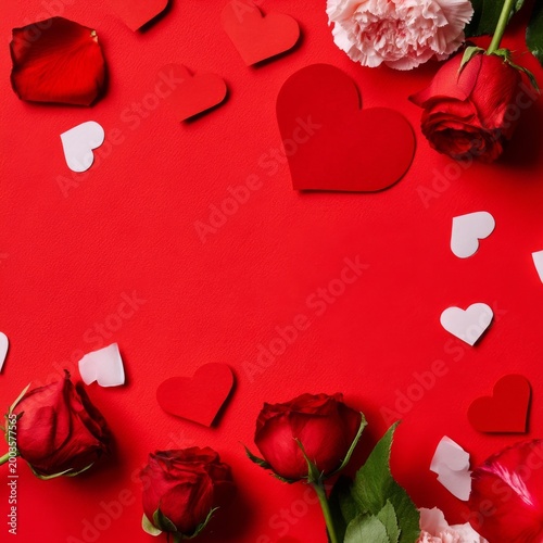 Roses and Hearts Decorate a Red Background for a Special Occasion or Celebration