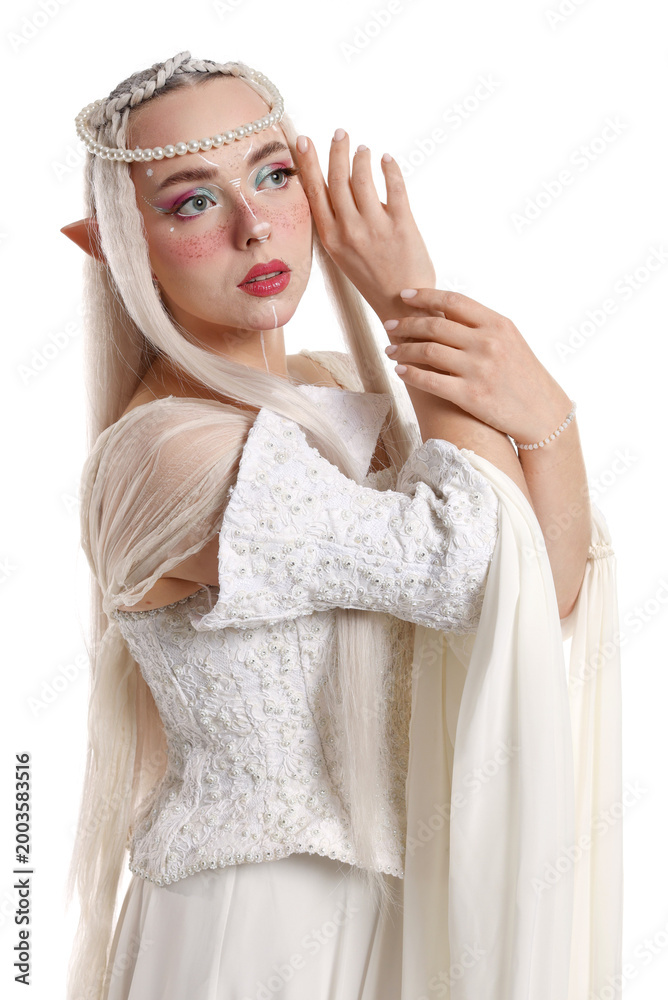 Fototapeta premium Portrait of beautiful elf girl on white background