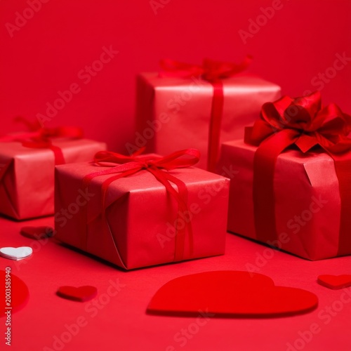 Gifts and Hearts on a Red Background for a Special Day Celebration