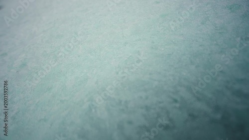 Pov walk in Antartica on frozen lake with beautiful crystallized pure ice texture