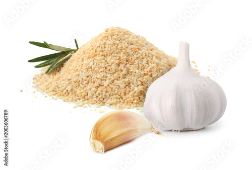 Quadro su tela Granulated dried garlic, fresh bulb and clove isolated on white