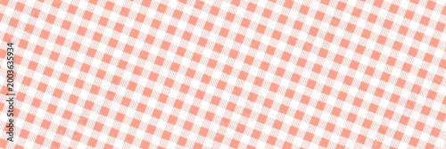 Pastel peach colored checkered picnic tablecloth. Gingham seamless pattern for fabric design, textile, wallpaper, wrapping paper, plaid background. Vichy print.