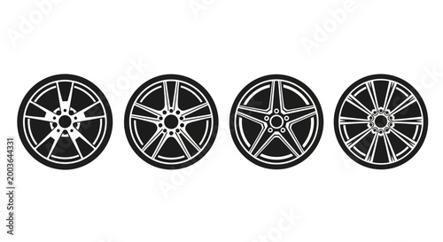 Obraz na płótnie Set of four distinct car alloy wheel designs in a clean, monochromatic illustrat