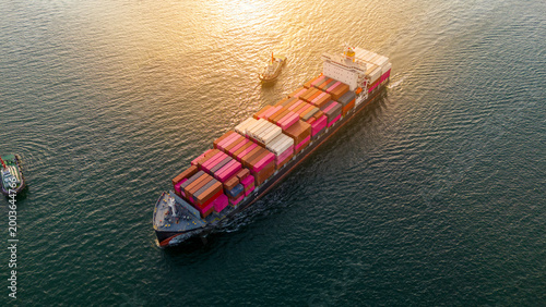 Cuadro en lienzo cargo container ship sailing on the sea at sunset
