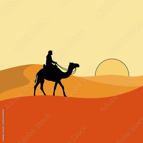 Silhouette of a Man Riding a Camel in the Desert at Sunset