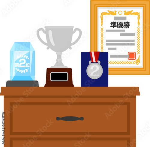 棚の上に並んだ第二位のトロフィーやメダル