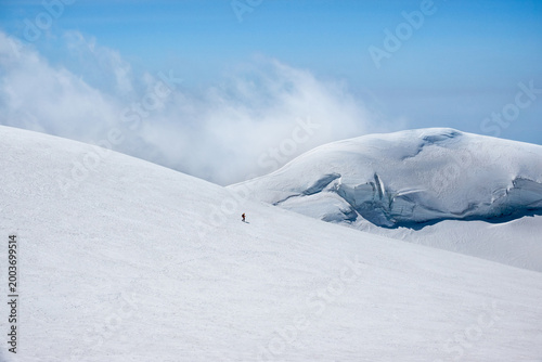 Risk management in extreme alpine environment, solo climber navigating glacier terrain with caution and awareness. Spaghetti Tour Route Rifugio Gnifetti Alagna Valsesia, Piedmont / Italy - July 19 202