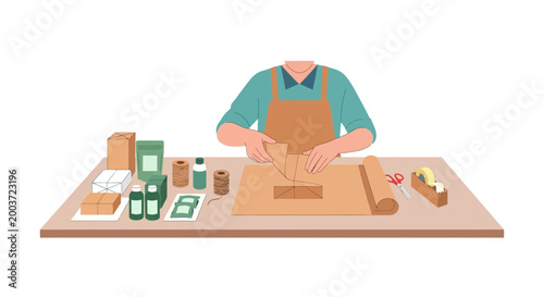 Person packing box, shipping supplies on table