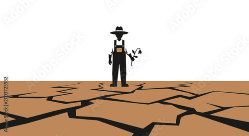 Farmer in drought holding wilted flower