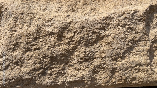 Fotografie Rough grunge brown sandstone block texture background with natural cracked rocky