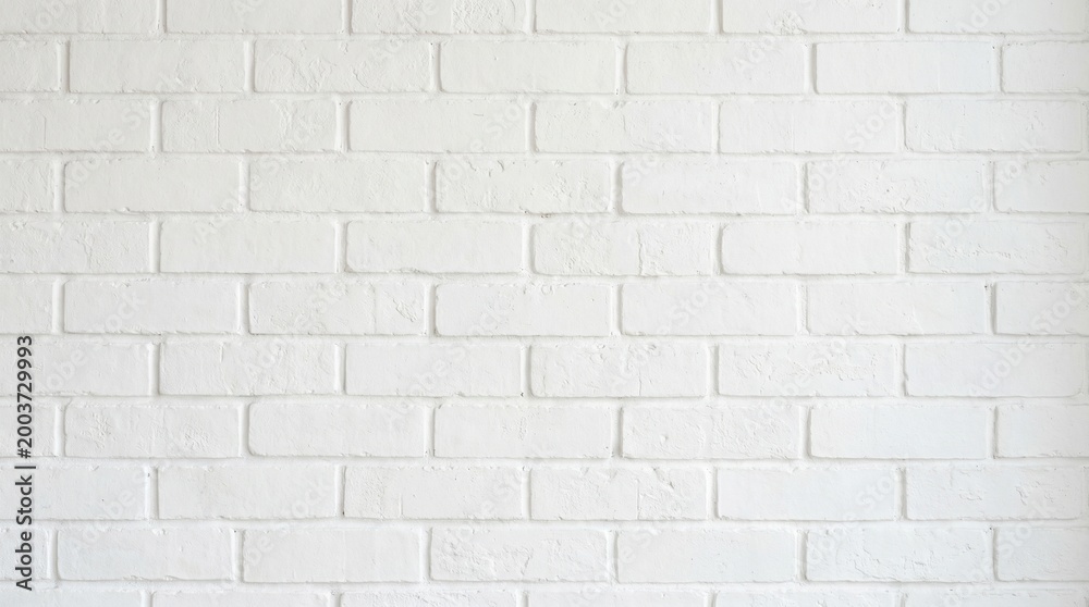 Obraz premium A close-up view of a white brick wall with rectangular bricks