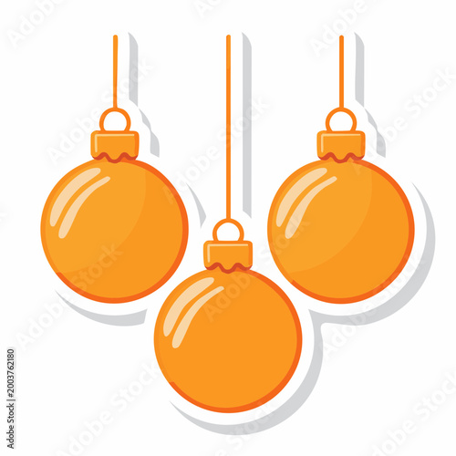 Three Orange Christmas Ornaments Hanging