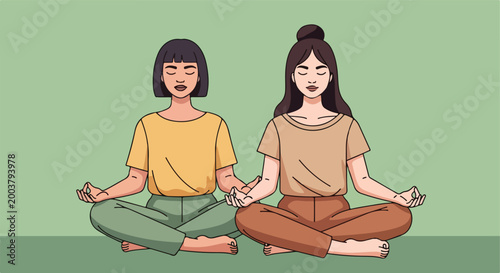 Two young women sitting in a meditative pose on a solid muted green background