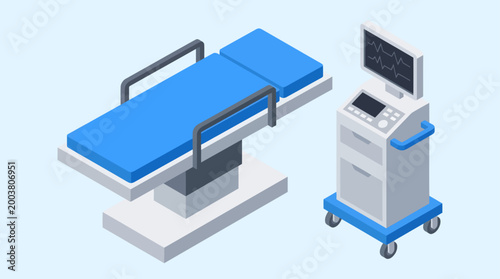 A modern blue and grey isometric operating table stands ready beside a rolling medical cart featuring an electrocardiogram monitor displaying active vital signs in patient care and surgical procedure