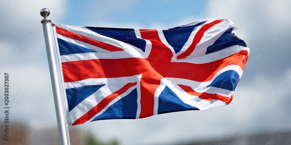Fototapeta premium The Union Jack flying proudly during a national holiday or public celebration in the UK. 
