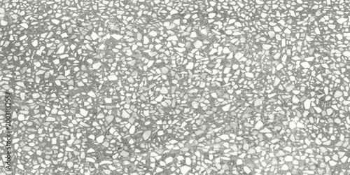 Grey terrazzo floor texture with small stone chips and speckled pattern design