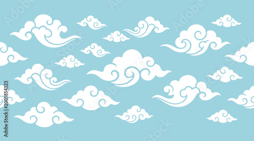 White clouds on blue background pattern.
