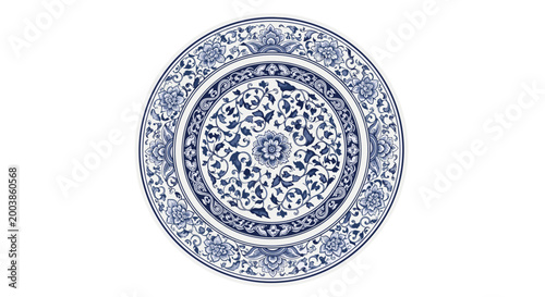Intricately patterned blue and white ceramic plate with floral motifs on a white background, showcasing elegant craftsmanship and symmetrical design