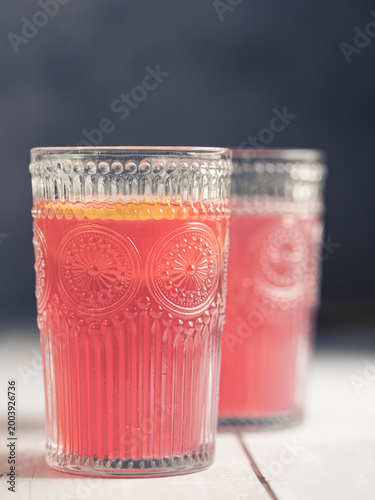 Refreshing glass of red fruit saft, pink lemonade