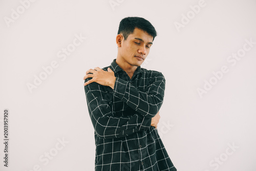 Photography the man is wearing a black long-sleeved shirt with a white grid pattern