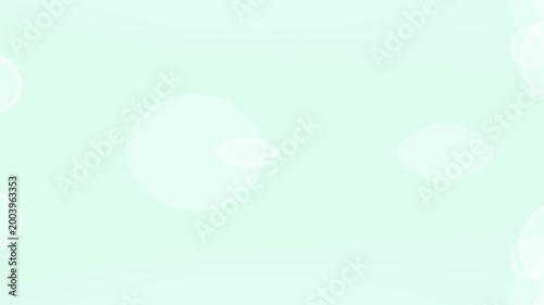 Soft mint green background with white bokeh lights