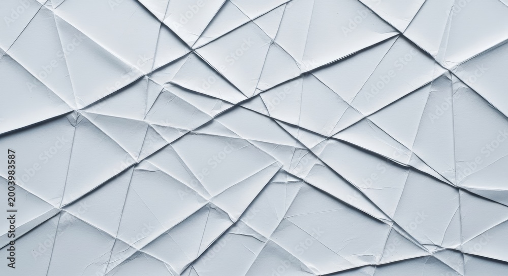 Fototapeta premium Geometric Pattern of White Origami Paper with Multiple Creases and Fold Lines