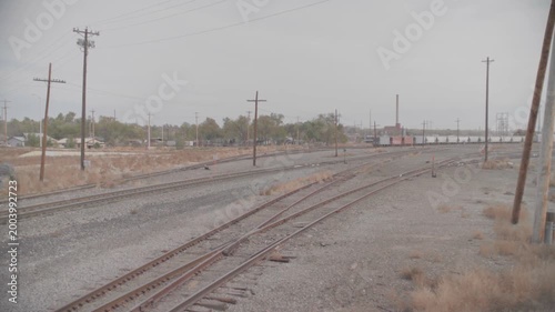 Railroad Tracks Converging in Wide Industrial Rail Yard