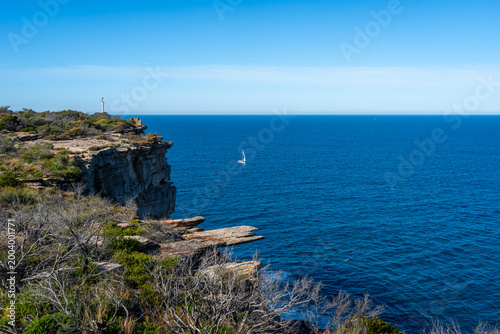 Dramatic coastal cliffs along Fairfax Walk in Manly, Sydney, Australia