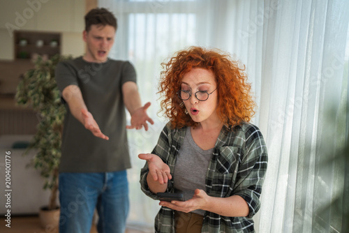 Foto Couple having conflict argument over communication issues at home