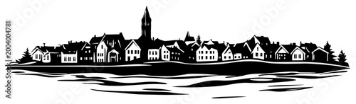 Small European coastal town silhouette panorama with church spire and houses by the water